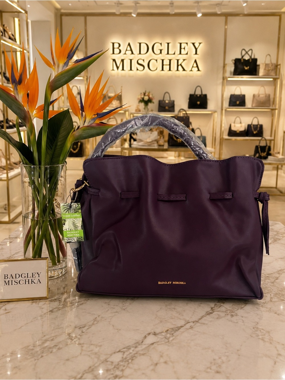 Badgley Mischka plum vegan leather dumpling bag